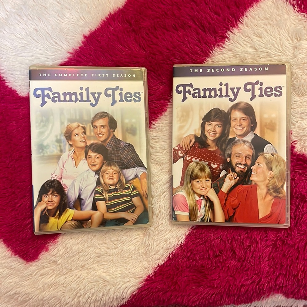 Family Ties dvd sets  first season and second season like new!